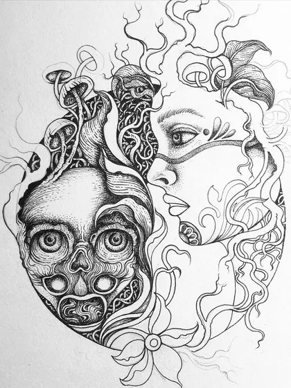 A progress shot showing the skull and mushrooms being inked.