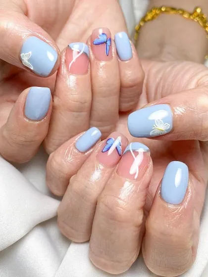 Another view of this beautiful butterfly set on natural nails.