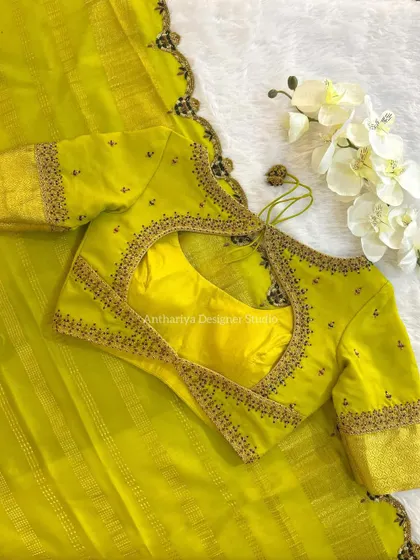 The back view of the lime green blouse, perfect for a fresh and modern look.