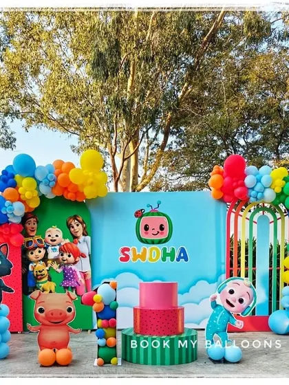 Swdha's Cocomelon party was a colorful outdoor celebration. The setup featured the whole Cocomelon family, with bright, primary-colored balloons and a cheerful backdrop perfect for singing and playing.