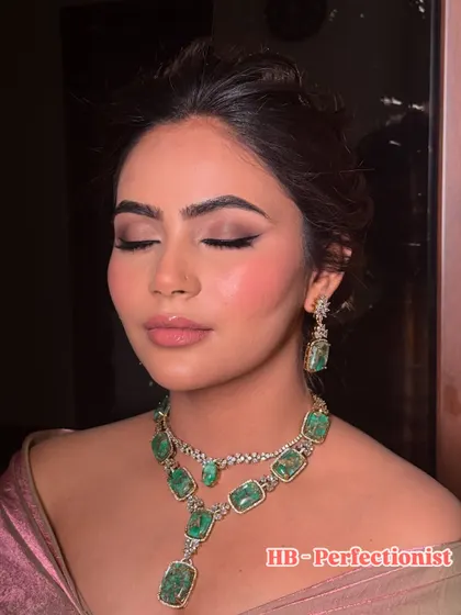 The final look, with perfectly defined eyes and a flawless base. This is a great example of my signature "sultry glam."