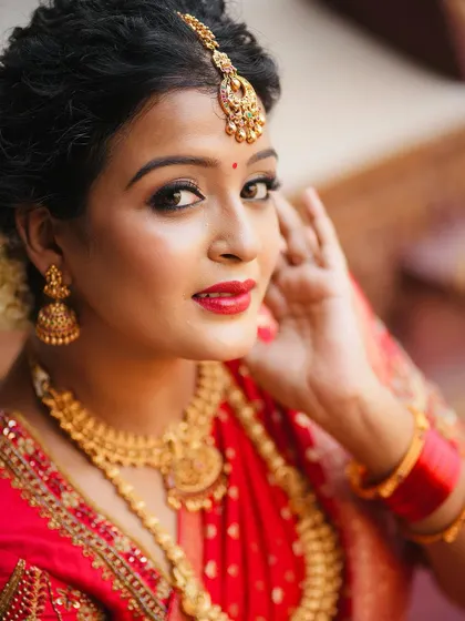 The perfect bridal portrait, capturing the beauty of the moment and the elegance of the attire.
