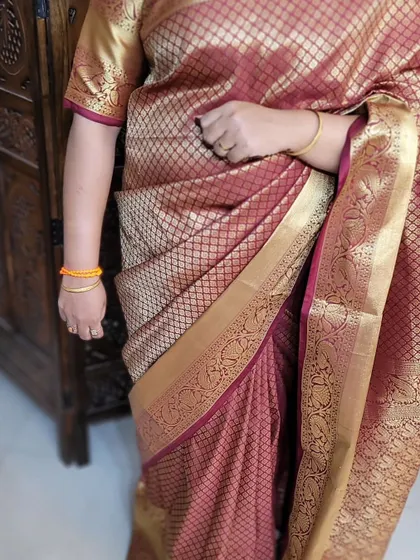 The hip pleat section of Aditi's self-draped saree, showing a neat and secure tuck.