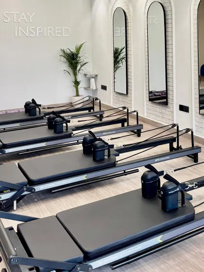 A shot of our beautiful Vasant Vihar studio, with reformers lined up and ready for our members. The space is clean, bright, and inspiring.