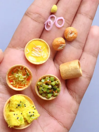 A handful of Kathiawadi thali components, showing the detail in each tiny piece.
