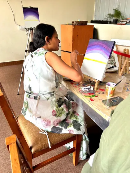 The beginning stages of a painting, with the background colors blended and ready for the next layer. Our instructors guide you step-by-step.