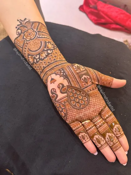 A classic Indian henna design with a large peacock figure, perfect for any festive occasion.
