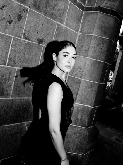 A dramatic black and white photo that highlights the silhouette and the mood of this powerful ensemble.