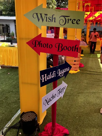 Another example of our fun directional signage. These signs not only help guests navigate the event but also add to the festive and playful atmosphere of a Haldi or Mehendi day.