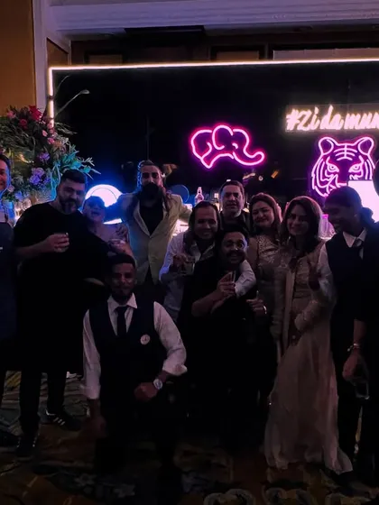 Our team posing with happy clients at the end of a fantastic night. A successful event is our biggest reward.
