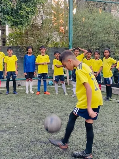 A player from our Elite Squad focuses on a juggling challenge. This drill is excellent for improving ball control, touch, and coordination.