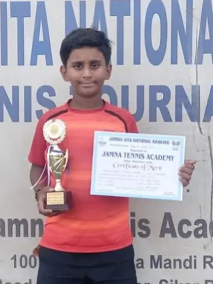 Sanjay Girish proudly displays his trophy after a successful run at the AITA National Ranking tournament in Jaipur, where he was a Singles Semifinalist.