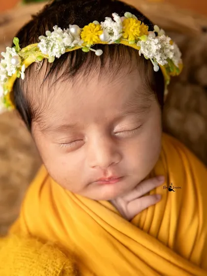 A detailed close up of a newborn's face, showing the soft skin and perfectly formed features that change so quickly.