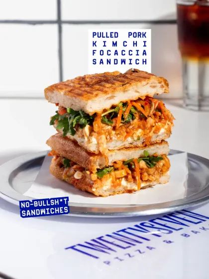 My Pulled Pork Kimchi Focaccia is a flavour bomb. The tender pulled pork, spicy caramelized kimchi, and creamy peanut dressing are all packed into a freshly baked rosemary focaccia.