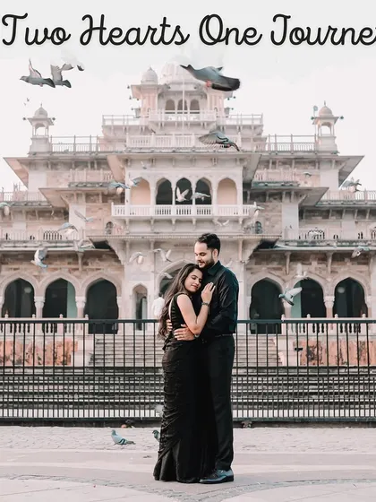 A classic romantic pose in front of the Albert Hall Museum, with pigeons taking flight to create a dynamic and memorable pre-wedding photograph.