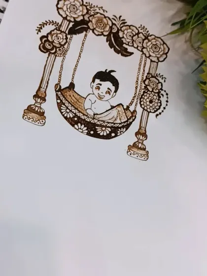 Another view of the baby shower design, showcasing the detailed floral decorations on the swing.