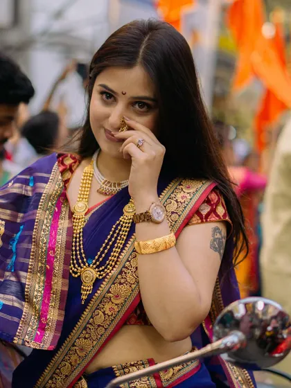A collection of portraits from the Gudi Padwa parade in Girgaon. The series showcases women in stunning traditional attire, playing dhols and riding motorcycles, blending tradition with modernity.