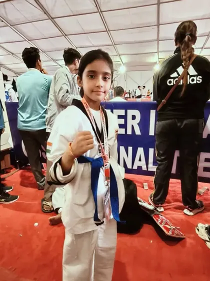 My champ Naysha, focused and ready, at the CBSE National Championship. She fought hard to win her silver medal.