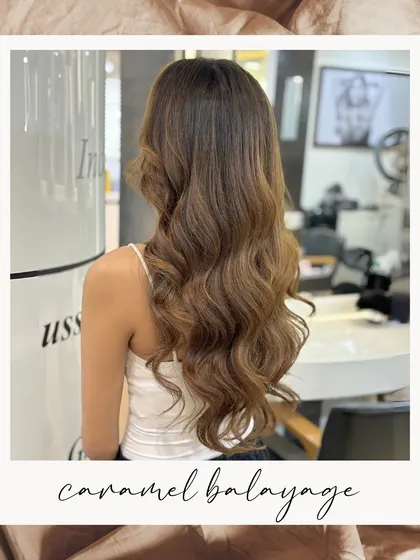 Kick off the season in style with this stunning Caramel Balayage. The warm, sweet tones are perfect for a holiday hair makeover.