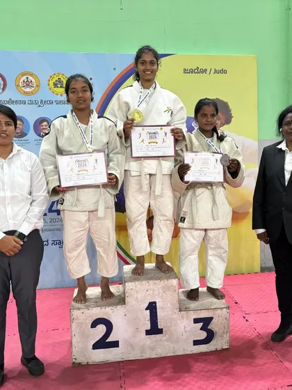 Standing at the top of the podium. Coach Ramya after her dominant performance in the Judo championship.