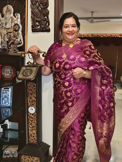 My client posing by her beautiful antique phone. Her timeless hair and makeup look perfectly at home in this elegant setting.