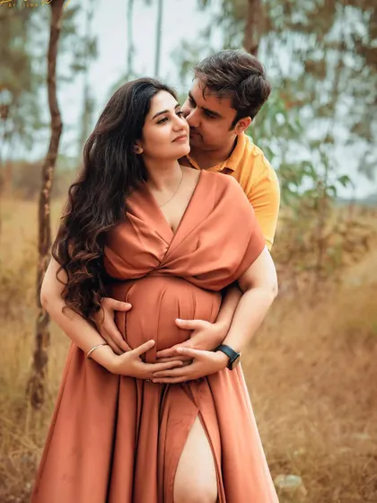 The way he holds her is so full of love and protection. An outdoor maternity session is a wonderful way to capture these tender moments.