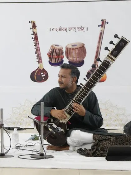 A moment of quiet reflection during my performance at the Saptak Sangeet Sankalp in Ahmedabad. The backdrop beautifully illustrates the instruments that create our music: the Sitar, Tanpura, and Tabla.