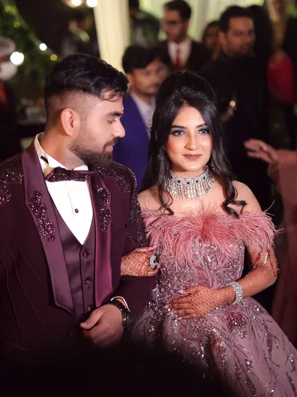 A candid moment of the happy couple. Gurusha's unique and glamorous look makes a stunning statement next to her fiancé.