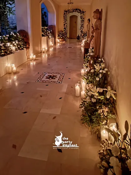 Another view of the candlelit hallway, showing how the warm glow of the candles created a soft, romantic ambiance along the marble corridor.