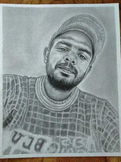 A casual portrait of a man in a cap. I can work with any style of photo you send me.
