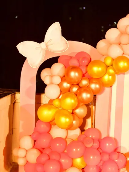 A detail shot of the Minnie Mouse decor, showing the bow accent on the arched backdrop.