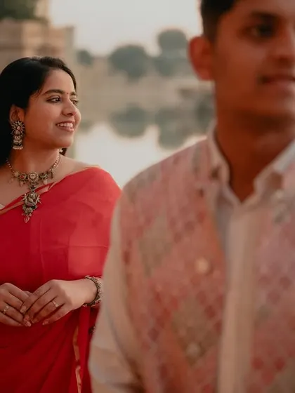 A candid moment of the bride looking lovingly at her partner. We focus on capturing those unscripted glances and expressions that truly define a couple's connection, even amidst a posed session.