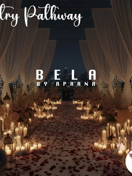 The journey to "yes" begins with a fairytale entrance. I create these pathways using hundreds of candles and fresh rose petals to set a deeply romantic and dramatic tone from the very first step.