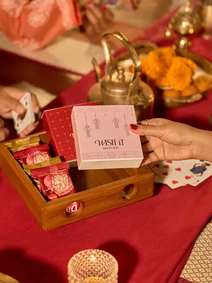 Another look at the mini sweet boxes, featuring a lovely pink design with lantern motifs. They are perfect for sharing sweetness during the festive season.
