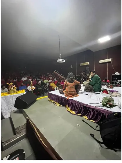 A view from the back of the stage during a packed concert in Surat. The energy from the audience fuels every beat I play.