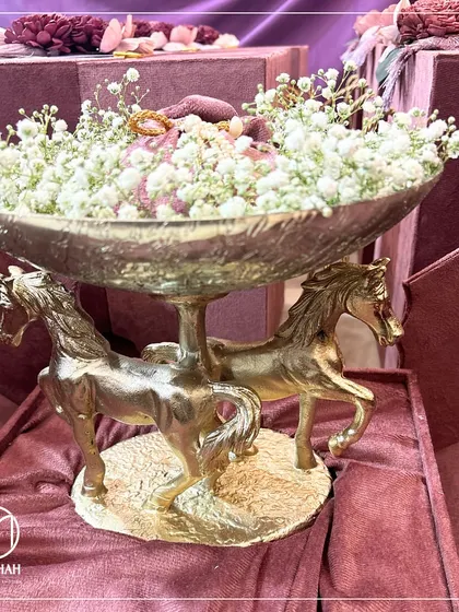 A masterpiece of grace and power, our double-horse bowl is more than a gift; it's a statement centerpiece. Presented in a custom velvet box, this is how I help clients celebrate lasting relationships and unforgettable moments with unparalleled grandeur.