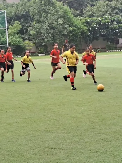Girls from different houses compete with passion during the Inter-House Football Tournament. We are committed to promoting girls' participation in all sports, fostering an environment of equality and empowerment.