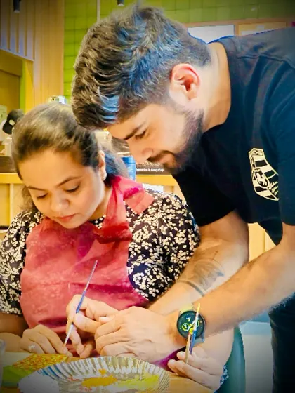 A couple creating art together at one of my workshops. It's a wonderful and unique date idea, where you can collaborate on a piece and have a fun, creative experience.