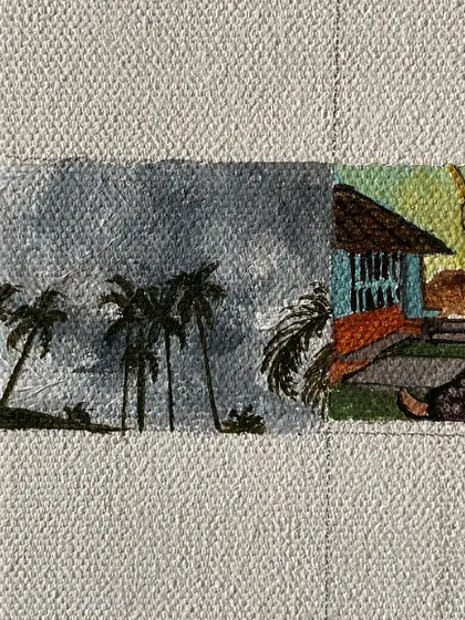 A mini-painting of a stormy sky over palm trees.