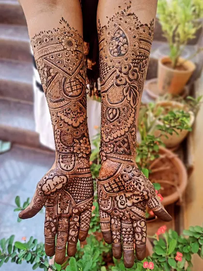 So much detail packed into this bridal design. I love mixing different elements like florals, paisleys, and geometric patterns to create something unique.