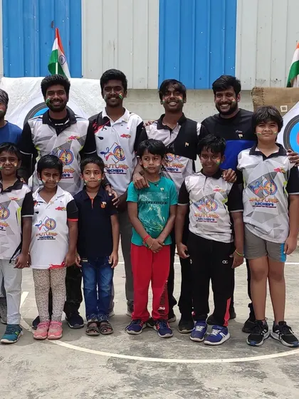 Posing with some of our youngest and most enthusiastic archers. It's a joy to coach them and be part of their journey in the sport.