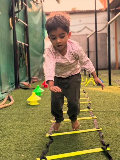 This little champion is mastering the agility ladder, a great tool for improving footwork and speed.