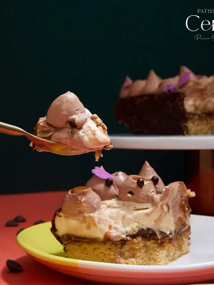 A spoonful of the "Go Nuts for Hazelnuts" shows the light texture of the mousse and the richness of the layers beneath.