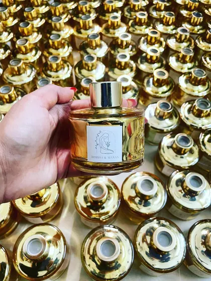 A full view of the custom reed diffusers, showing a large order ready for a special announcement.