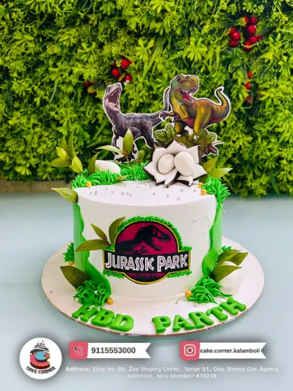 Roar! A Jurassic Park themed cake for Parth's birthday. Featuring a T-Rex and Velociraptor, it's a thrilling cake for any dinosaur fan.
