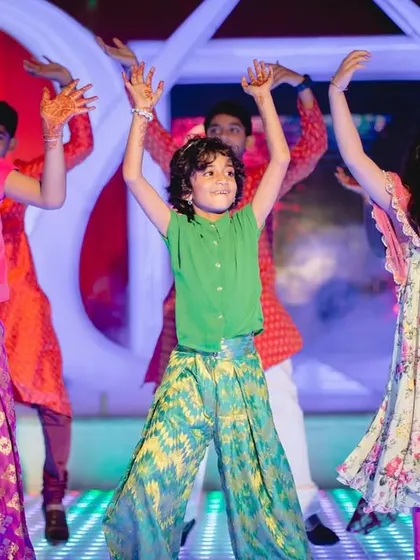 Pure joy and energy from our youngest dancers. Choreographing for kids is all about making it a fun game, and their natural enthusiasm always lights up the sangeet night.