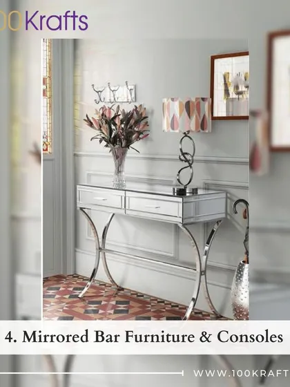 A mirrored console adds a touch of glamour to an entryway, creating a bright and welcoming first impression.