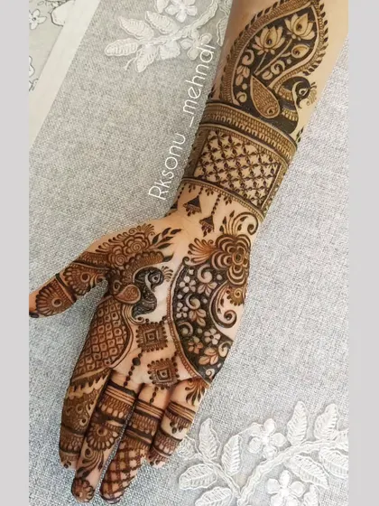 This gallery showcases a variety of my traditional designs. You'll find classic elements like peacocks, elephants, lotuses, and intricate jaali (net) patterns, all expertly crafted to create timeless beauty.