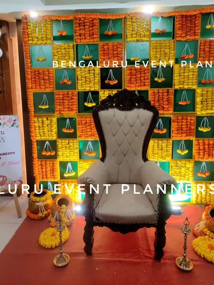 For this traditional baby shower, I created a complete setup including a beautiful marigold backdrop, a comfortable throne for the mother-to-be, and a personalized welcome sign. This arrangement honors cultural traditions while ensuring a comfortable and celebratory atmosphere.