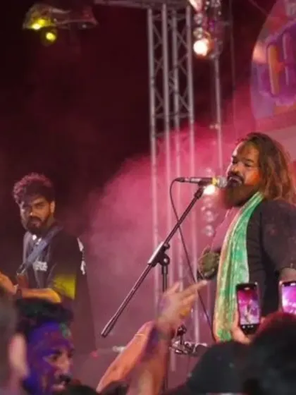 The vibe was electric at our Holi show in Pattaya. Here we are, covered in colors, sharing the energy with a massive crowd.